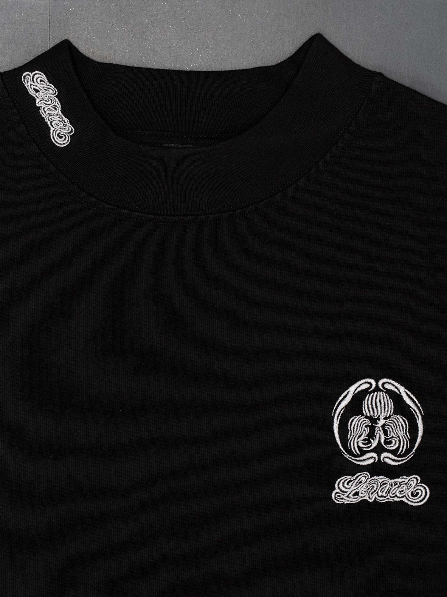 レディースウェア WM VEAL LOGO MOCK NECK SHIRTS BLACK ANGEL LOGO