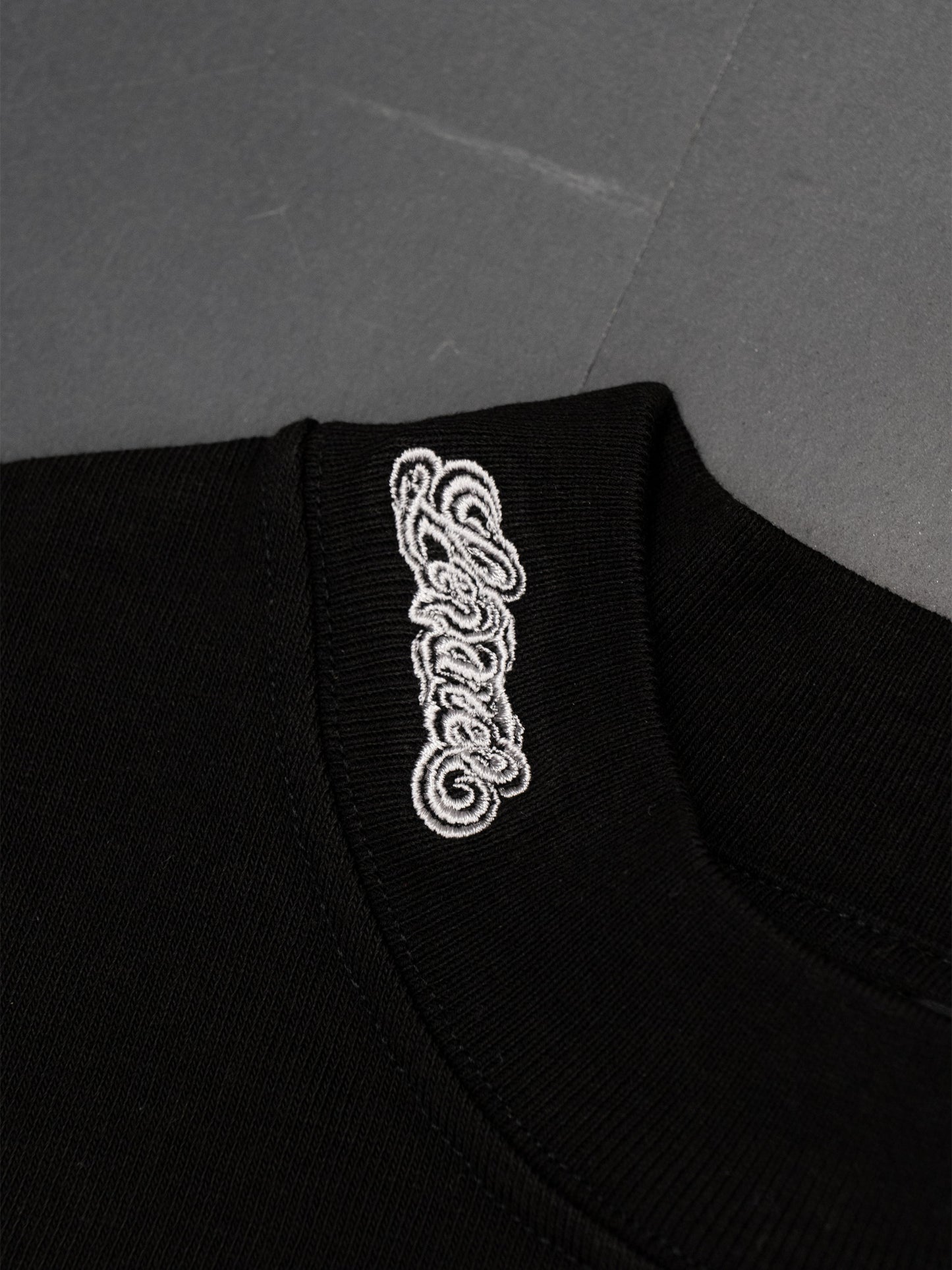 "ANGEL LOGO" MOCKNECK L/S TEE [BLACK]